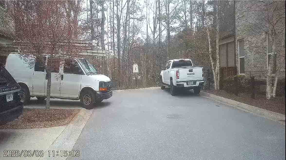 GMC Truck parked in fire lane sign